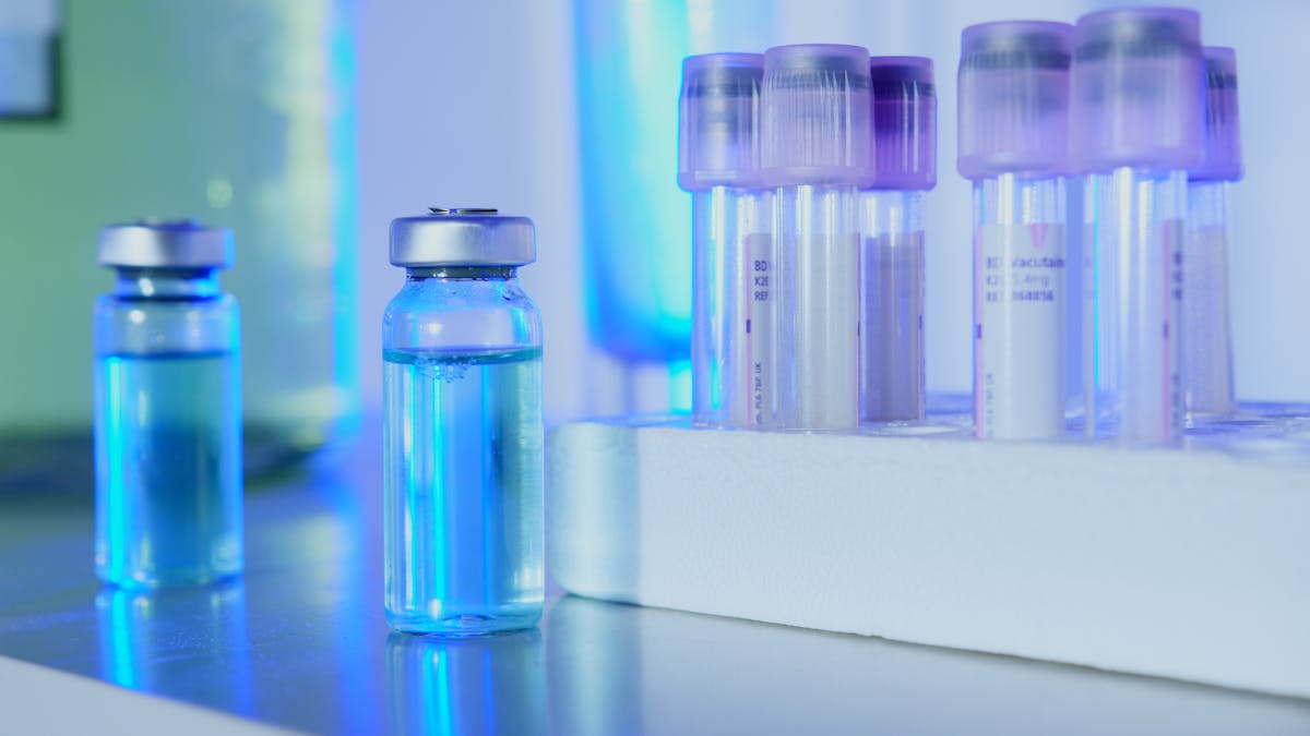 Diagnostic reagent vials and pipette in a clinical laboratory